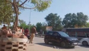 Video of a drunk police inspector went viral on social media. He hit a biker and collected Rs. 5000 from him by showing his power.