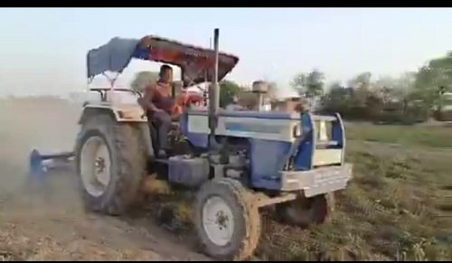 Tomato crop was grown by taking loan, when the farmer did not get the price, he ploughed the crop himself by driving tractor