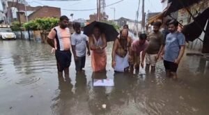 Rotting water in the street, development of chairman and MLA a joke - public gave a befitting reply by submerging the picture!