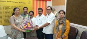 Congratulated the newly appointed Director Dr. Kavita Arya by presenting her a flower bouquet