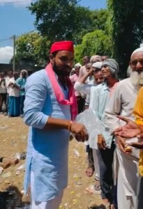 Biscuits and water were distributed to farmers standing in line for urea fertilizer.