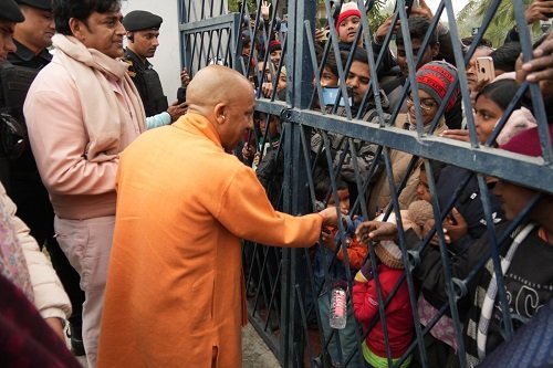 The children were overjoyed to receive blessings and chocolates from CM Yogi.