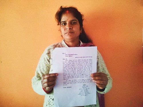 Thugs have seized ancestral land; a helpless woman pleads for justice.