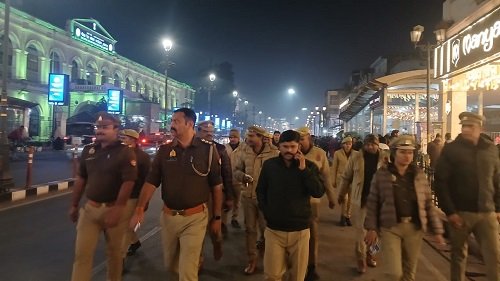 Hazratganj Inspector Vikram Singh conducted a foot march to review the security arrangements in the area.