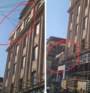 A worker died after a balcony collapsed.