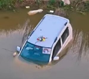 Car Plunges 50 Feet into River from Bridge While Attempting to Save a Child; Newlywed Driver Miraculously Survives