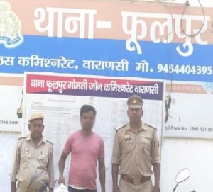 Accused arrested with 10 liters of illicit liquor.