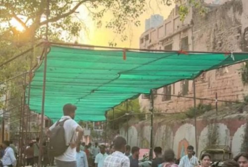 Shade offering relief from the sun—the Municipal Corporation's new gift for devotees.