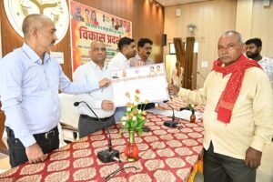 Glimpse of schemes at the development exhibition; beneficiaries received certificates; widespread publicity given to public welfare schemes.