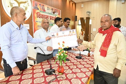 Glimpse of schemes at the development exhibition; beneficiaries received certificates; widespread publicity given to public welfare schemes.