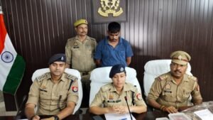 Arrested by Cholapur police for swindling people by posing as a police sub-inspector and promising them jobs.