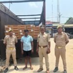 Major strike by Chandauli police before the consignment could reach Bihar: 1,035 liters of illicit liquor seized from a truck; driver arrested.