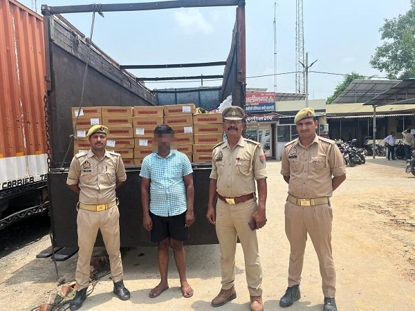 Major strike by Chandauli police before the consignment could reach Bihar: 1,035 liters of illicit liquor seized from a truck; driver arrested.