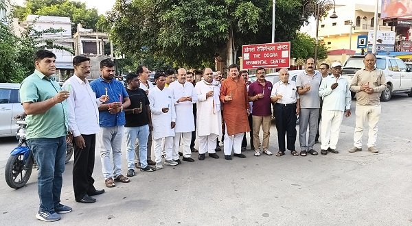 Congress holds candle march against NEET-CBSE exam irregularities; stages *Satyagraha* in support of students.