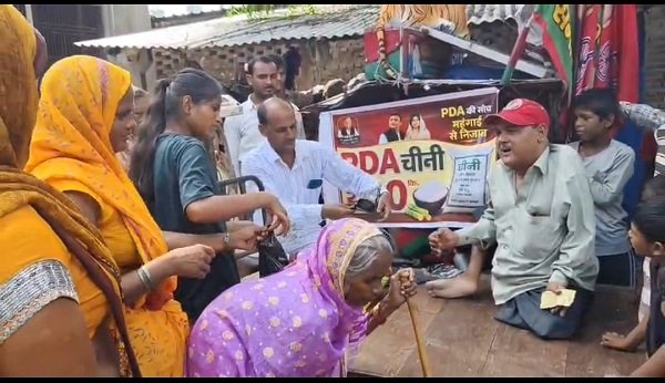 Ayodhya: Differently-abled SP leader's unique protest against the steep rise in sugar prices.