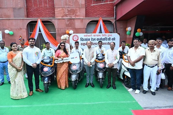 A gift of dignity and self-reliance under the shade of the Tricolour: five differently-abled railway employees received scooters.