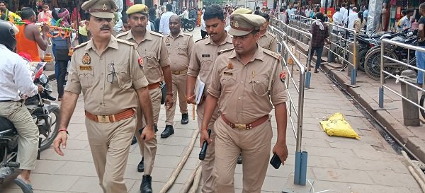 Police conduct foot patrols and warn encroachers to ensure the convenience of devotees during the month of Sawan.