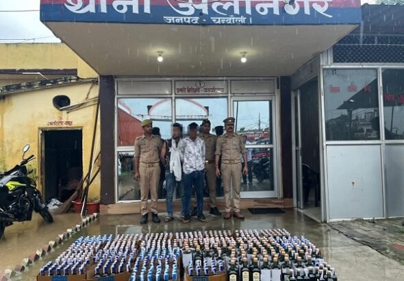273 liters of liquor seized from an Urban Cruiser with a fake number plate; attempt made to run the vehicle over police personnel; two arrested.