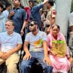 Political uproar in Delhi over allegations of pellet gun use against students; Rahul Gandhi stages a sit-in protest.