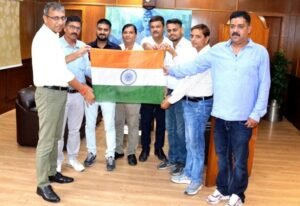 'Har Ghar Tiranga, Har Dil Tiranga': Message of patriotism resonates across Varanasi Division; DRM Ashish Jain distributes the Tricolour to railway staff.