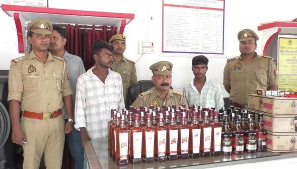 Swift action by Sigra Police: Two smugglers arrested with 75 liters of illicit Indian-Made Foreign Liquor (IMFL); major seizure made under the leadership of Station House Officer Shivakant Mishra.