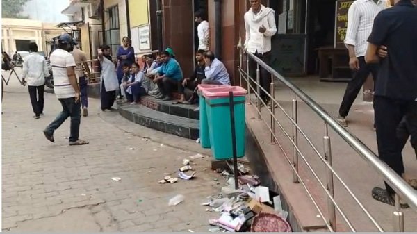 Sanitation workers at Ayodhya District Hospital go on strike over non-payment of salaries; stage a protest outside the emergency ward.