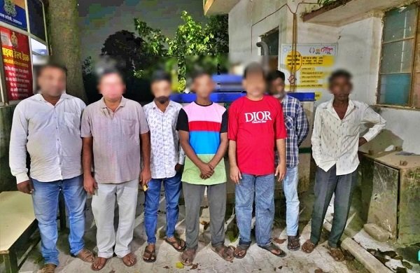 Seven individuals arrested for gambling in a public place in Prayagraj; ₹28,790 in cash and a deck of 52 playing cards seized.